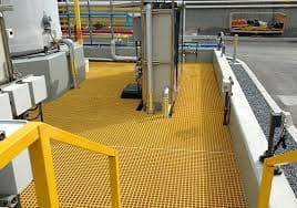 FRP lining being hand-laid inside a vessel